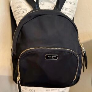 Kate Spade leather trim backpack